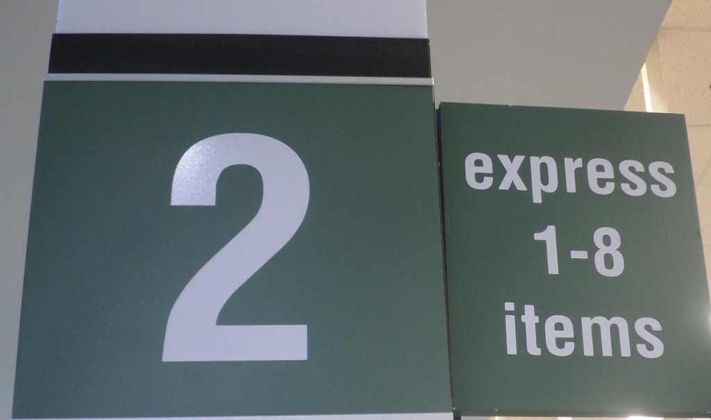 Signage for a grocery store's express lane