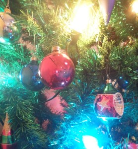 A close-up shot of a colourful Christmas tree