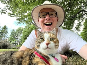 Ivy the Cat and the author, taken in August 2022