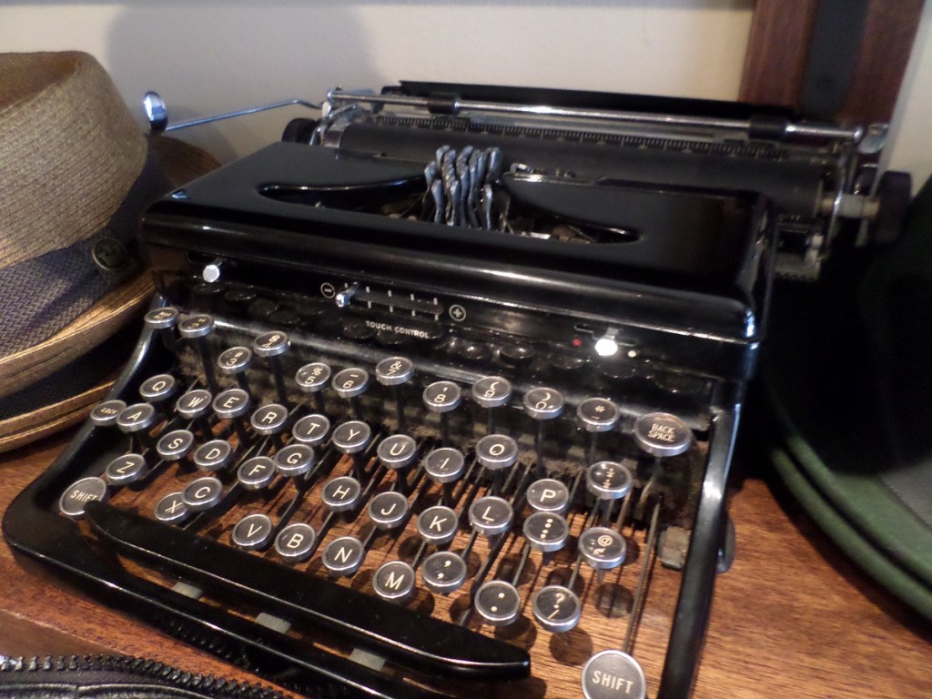 an old-fashioned typewriter with its keys stuck