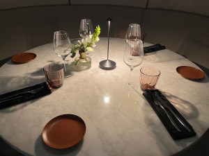 A tasteful, classy yet minimal table setting for 4 people.