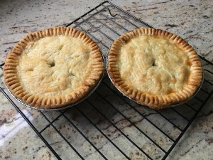 two pot pies on a kitchen counter