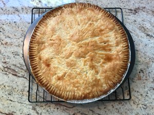 a beautifully baked tourtière, a traditional meat pie from Québec