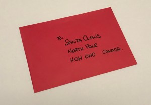 A red envelope addressed to Santa Claus