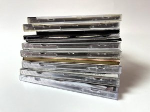 A stack of CDs on a white background