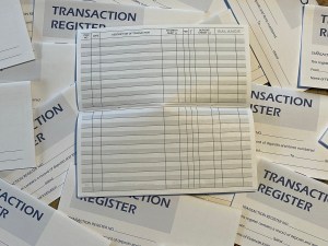 Transaction register booklets