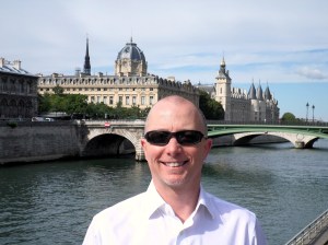 A photo of the author strolling along the Seine, checking out the sights of Paris (2013)